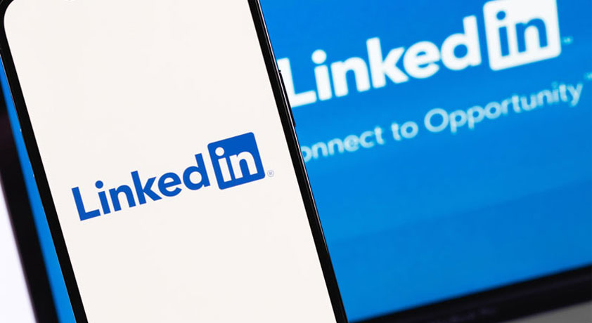 linkedin showing on a cell phone and desktop