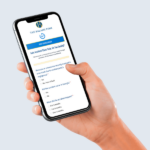Hand holding a smartphone displaying a mobile-optimized lead generation landing page for The Balams Firm auto accident claims.