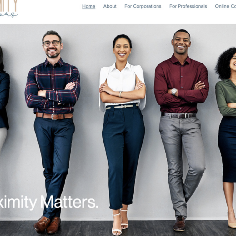 Group of business people dressed up standing in a line smiling